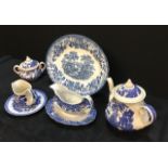 A group of assorted blue and white crockery items