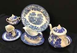 A group of assorted blue and white crockery items