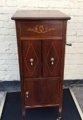 An Antique Grafonola with inlaid cabinet.