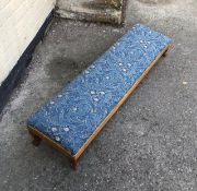 An antique double footstool.