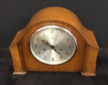 A vintage wooden cased mantle clock by Smiths of Enfield