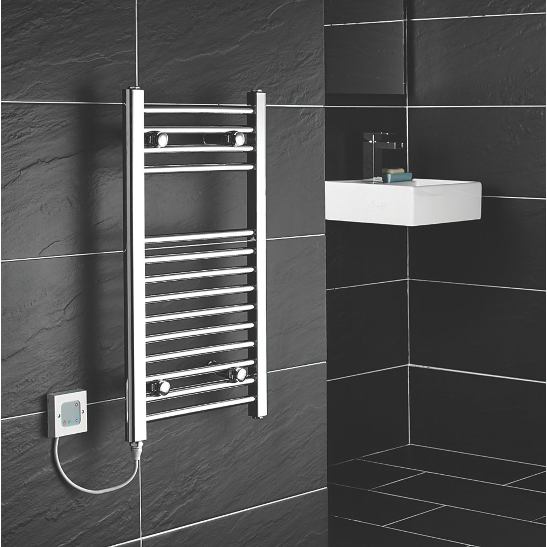 (REF19) FLOMASTA FLAT ELECTRIC TOWEL RADIATOR 700 X 400MM CHROME. Electrical installation only....