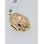 9ct yellow gold celtic design locket