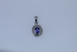 9k White Gold Tanzanite And Diamond Pendant