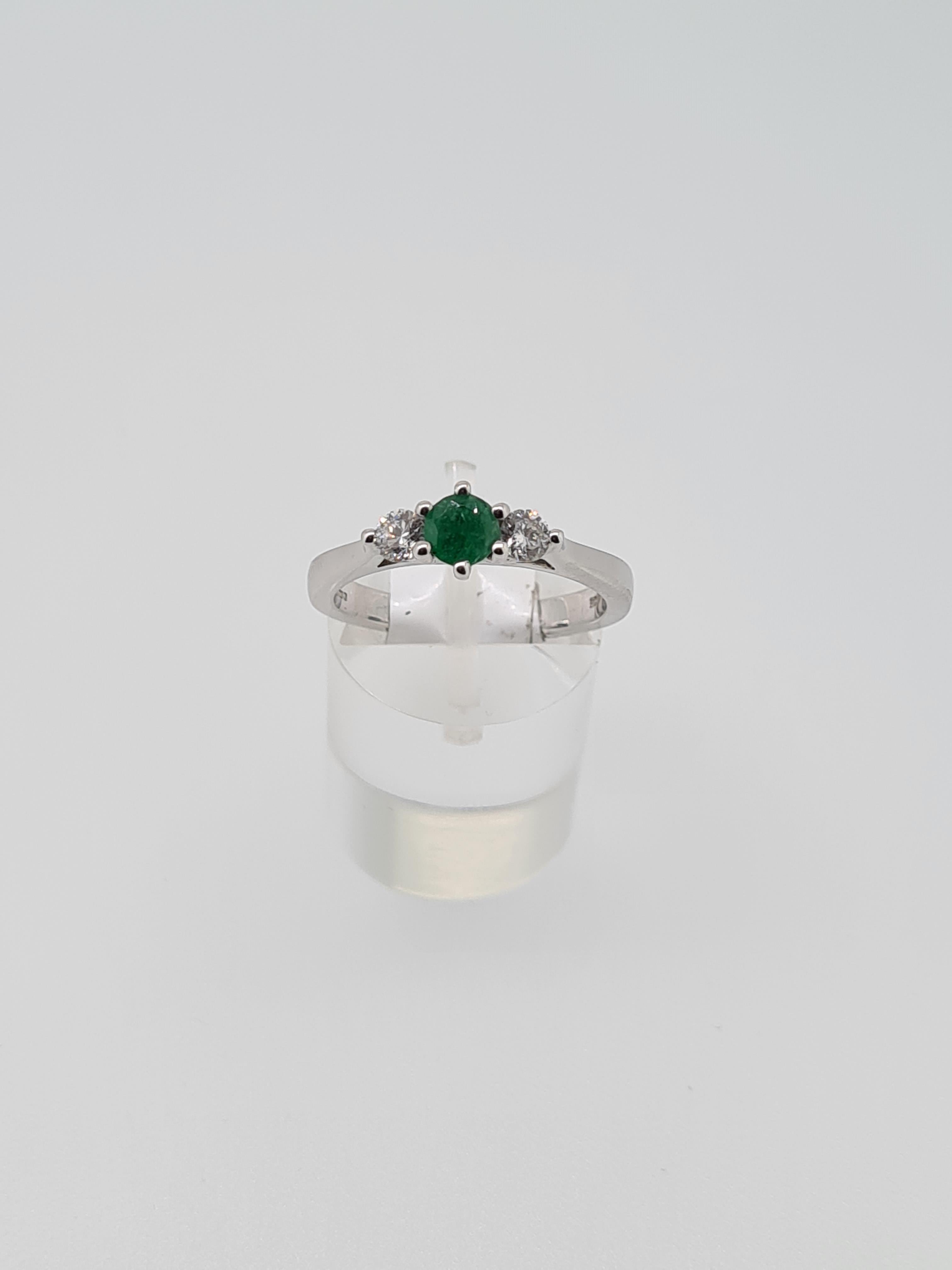 9ct white gold emerald and diamond ring