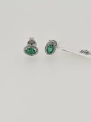 18ct white gold emerald and diamond stud earrings