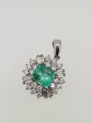 18ct white gold emerald and diamond pendant