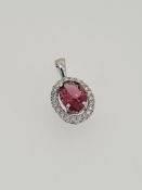 9ct white gold tourmaline and diamond pendant