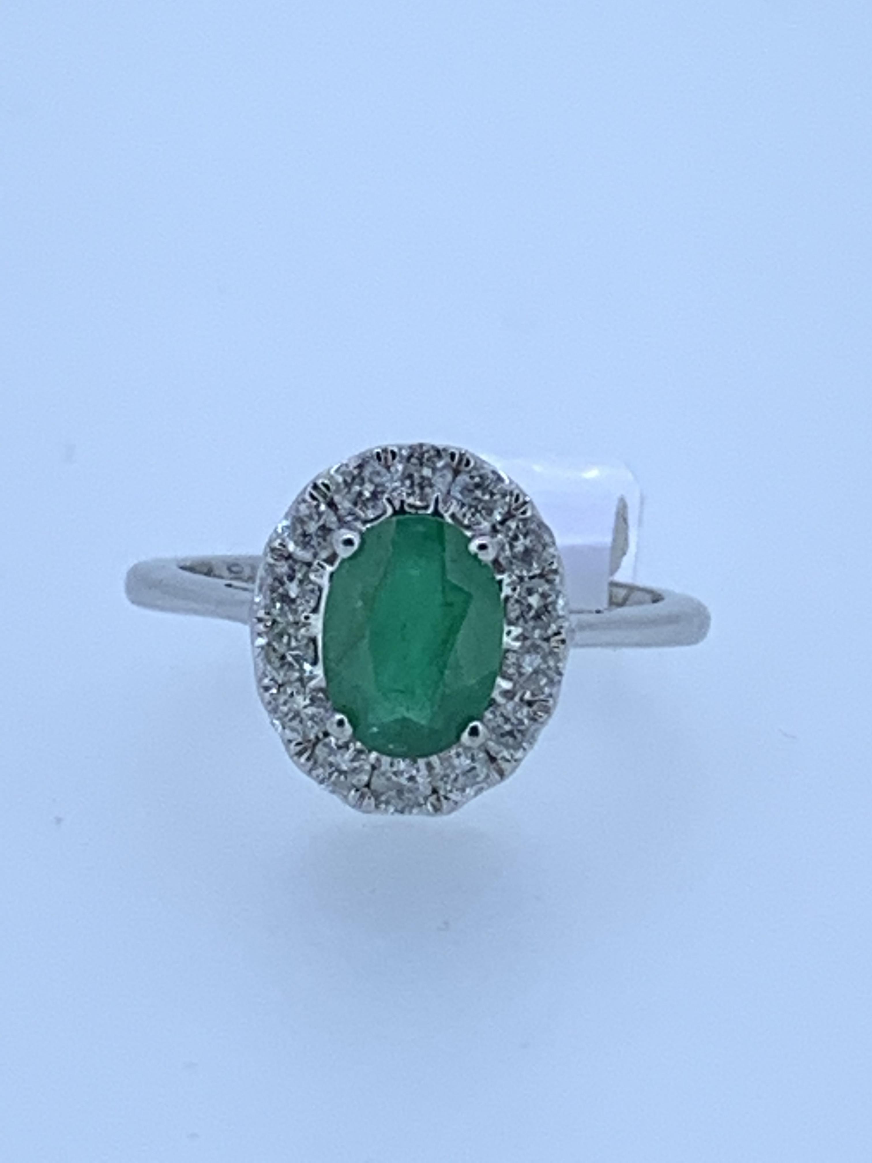 9ct white gold full Uk hallmark emerald and diamond ring