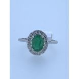 9ct white gold full Uk hallmark emerald and diamond ring