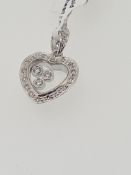 18ct hallmark white gold diamond set pendant