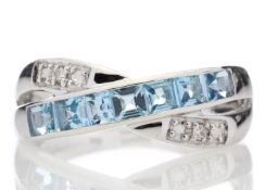 9k White Gold Blue Topaz And Diamond Ring