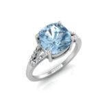 9k White Gold Cushion Cut Blue Topaz With Diamond Set Shoulders Ring