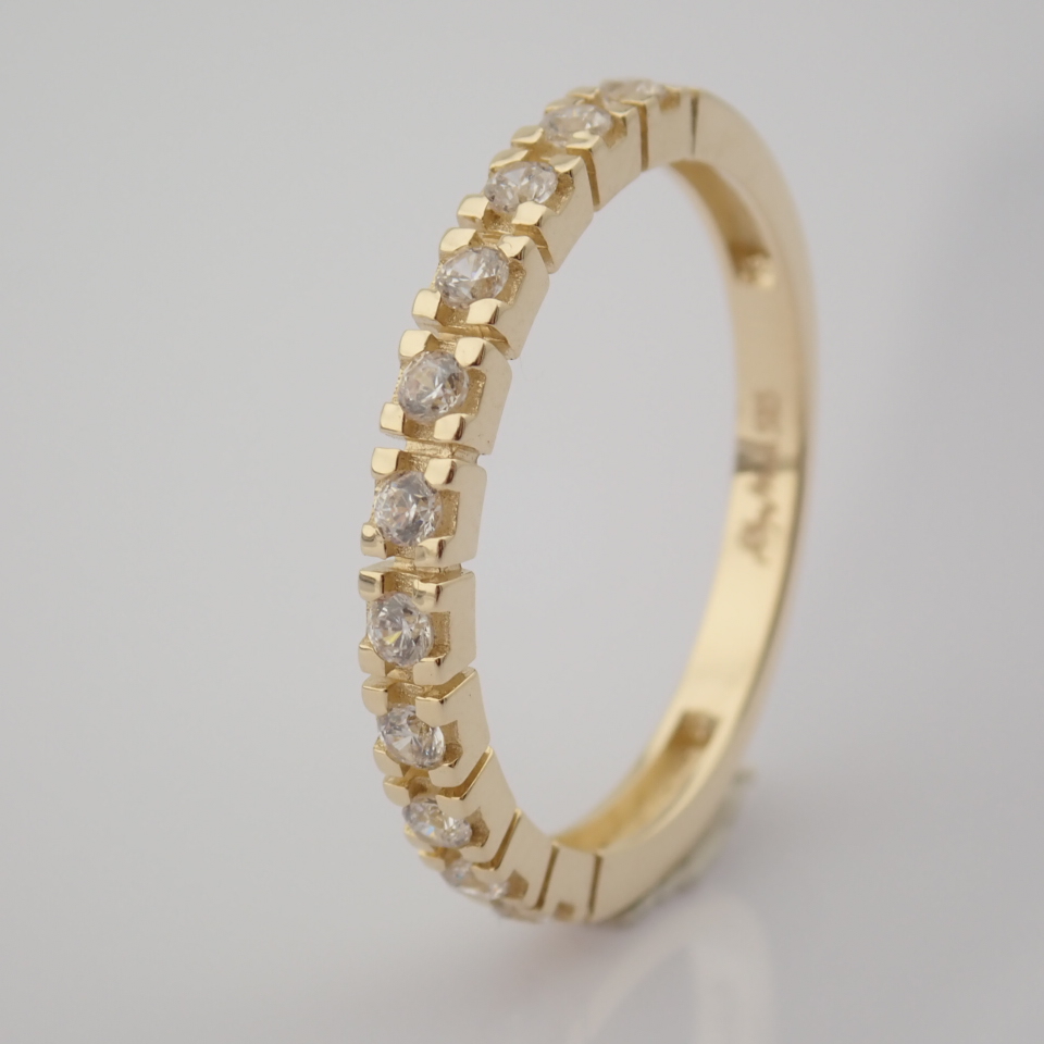 Swarovski Zirconia Ring. In 14K Yellow Gold