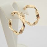 Earring. In 14K Yellow Gold