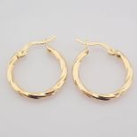 Earring. In 14K Yellow Gold