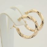 Earring. In 14K Yellow Gold