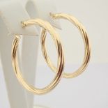 Earring. In 14K Yellow Gold