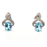 9ct White Gold Diamond And Blue Topaz Earrings