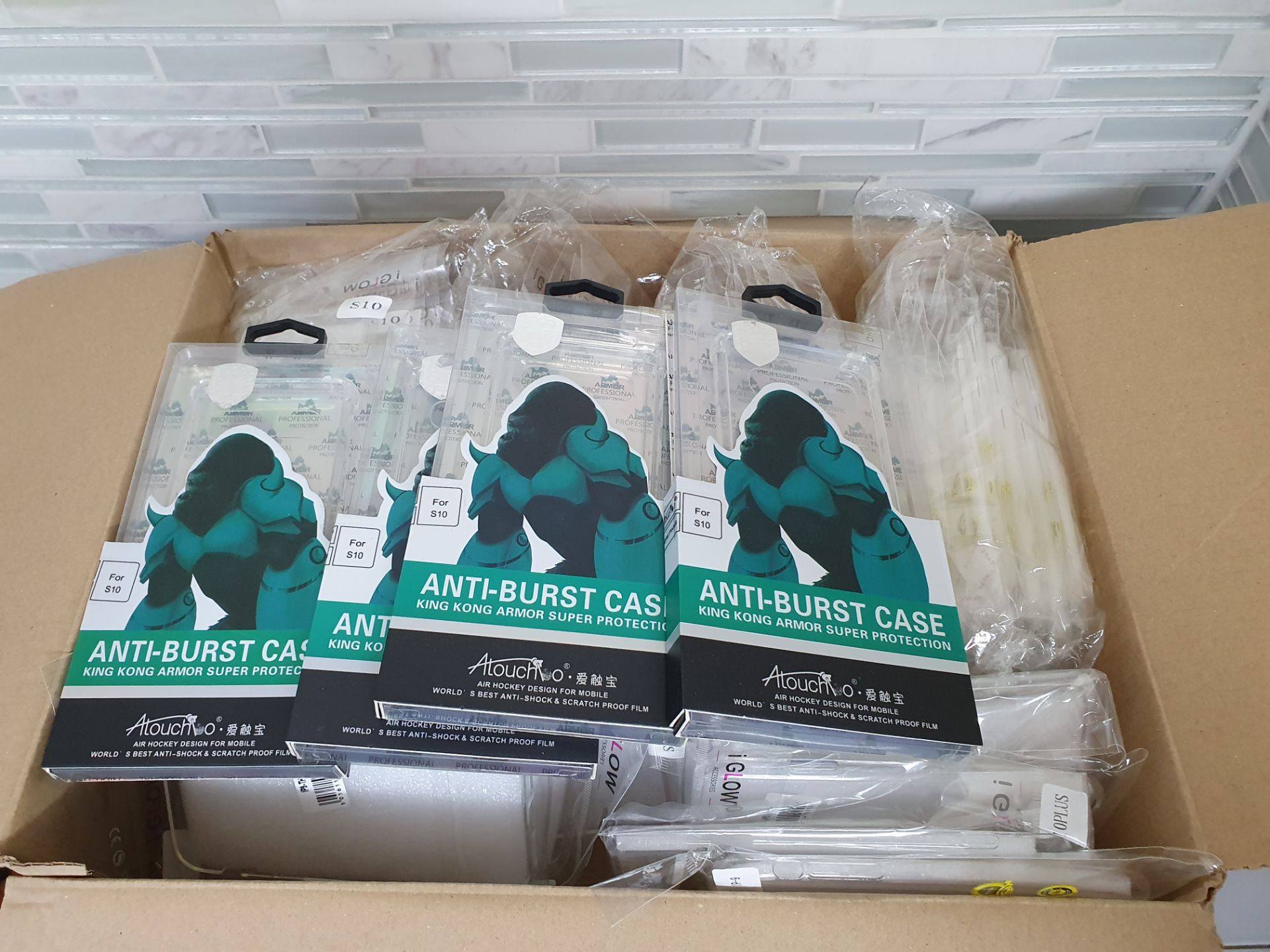 A Box Full Of Gel Cases For Galaxy S10, S10 Plus Iphone 9 Rrp £100