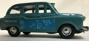 The Beatles 'You Know My Name' Die Cast London Taxi