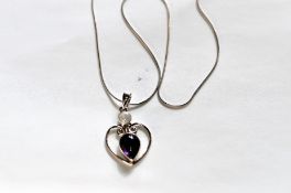 A Silver Amethyst & Opal Heart Shaped Pendant