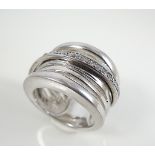 Silver ring with white stones