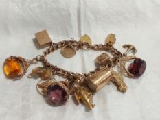 Vintage 9ct gold charm bracelet