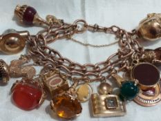 Vintage 9ct gold charm bracelet