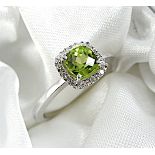 9k white gold peridot and diamond ring