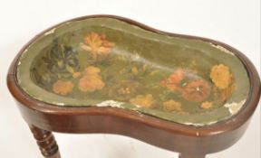 An 18th / 19th century regency mahogany kidney shaped bidet