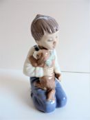 Lladro Nao Boy with Puppy Figurine
