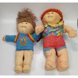 A Pair Of Vintage First Edition Cabbage Patch Dolls