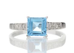 9ct White Gold Diamond And Blue Topaz Ring