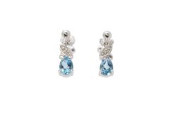 9ct White Gold Diamond And Blue Topaz Earrings