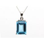 9ct White Gold Diamond And Blue Topaz Pendant