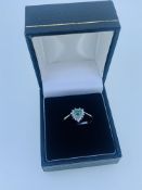 9ct yellow gold emerald and diamond ring