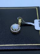 18ct yellow gold opal and diamond pendant