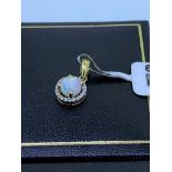 18ct yellow gold opal and diamond pendant