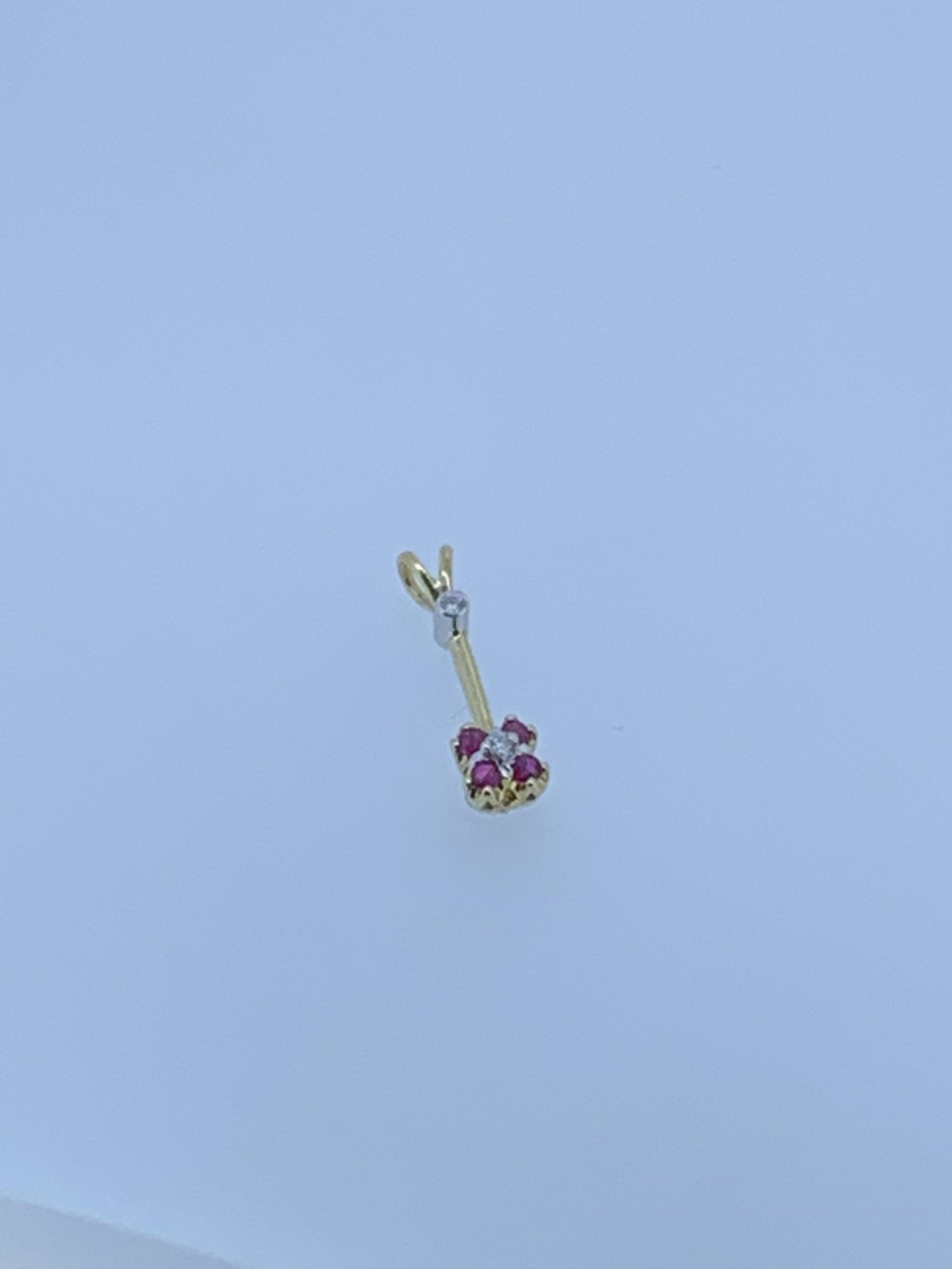 9ct yello gold ruby and diamond pendant