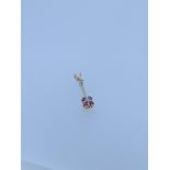 9ct yello gold ruby and diamond pendant