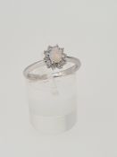18ct white gold opal and diamond ring