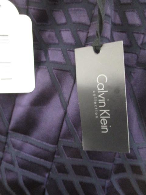 Brand new Calvin Klein Sussana cocktail dress size 8 purple and black design