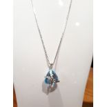 9ct 375 White Gold Diamond & Trillion Cut Topaz Pendant on a Silver Chain Necklace