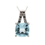 9ct White Gold Diamond And Blue Topaz Pendant