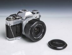 Kamera "Canon AE-1", Gehäusenr. 1324936, Objektiv Canon, 1:3,5/35 mm, Nr. 233224, m.