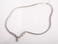 Collier 750 WG, besetzt m. 32 Brillanten von zus. ca. 2.0 ct in hohem Farb- u.