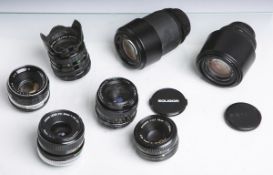Konvolut von 7 Objektiven, bestehend aus: 1x Sigma UC Zoom" (Multi-Coated, 1:4-5,6/70-210