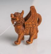 Tropenholz-Netsuke (Provenienz Japan, Alter unbekannt), geflügeltes,