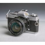 Minolta-Fotokamera "XG 9" (Japan), Gehäuse-Nr. 9004568, Objektiv Minolta, MC Rokkor-PG,Lens made